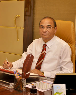 a close-up of a man smiling, dr d y patil 