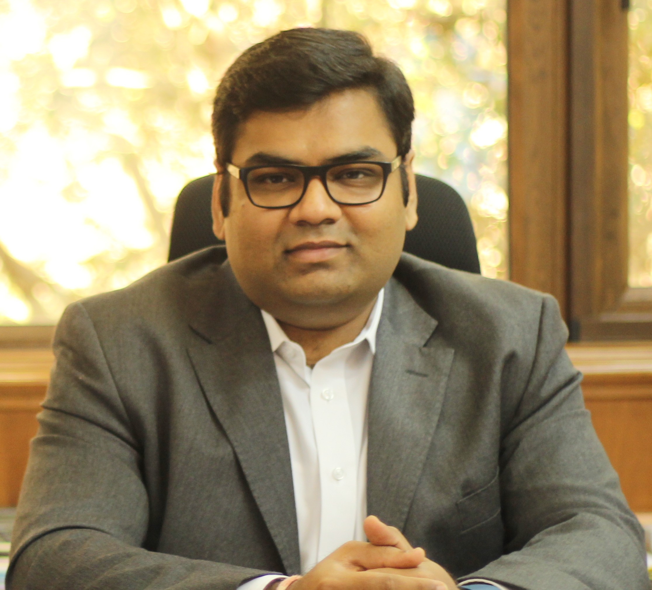 a close-up of a man smiling, dr d y patil 